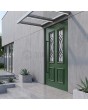 Green traditional style pivot door with glass