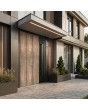 aluminium hinged entry door with nickel gold texture of milled metal