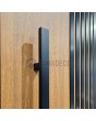 LIM RAIL6 - aluminium front  door with black vertical slats made of aluminium profiles