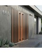 Golden oak aluminium front double door with black vertical slats made of aluminum profiles