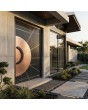 Aluminium hinged door covered with Sahara Noir sintered quartz and copper sheet
